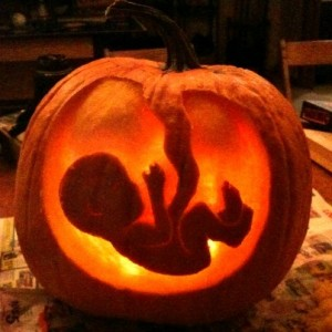 Creative Halloween Pregnancy Announcement with Pumpkin